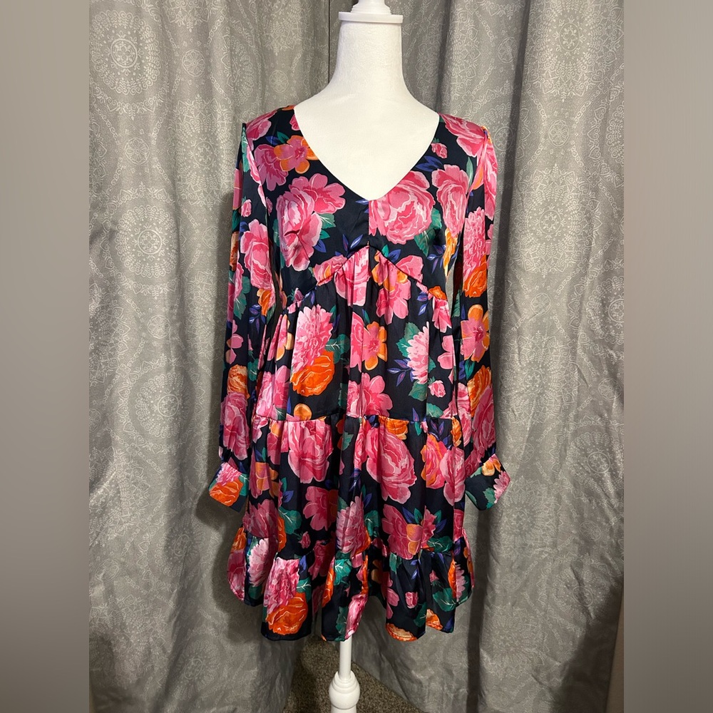 Multicolored floral dress on navy background.